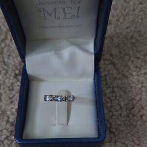 Gold Band Ring with Pale Blue Gemstones